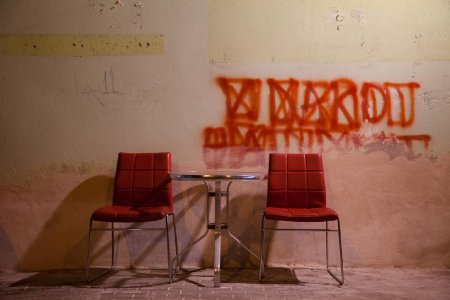 Red chairs and red graffiti